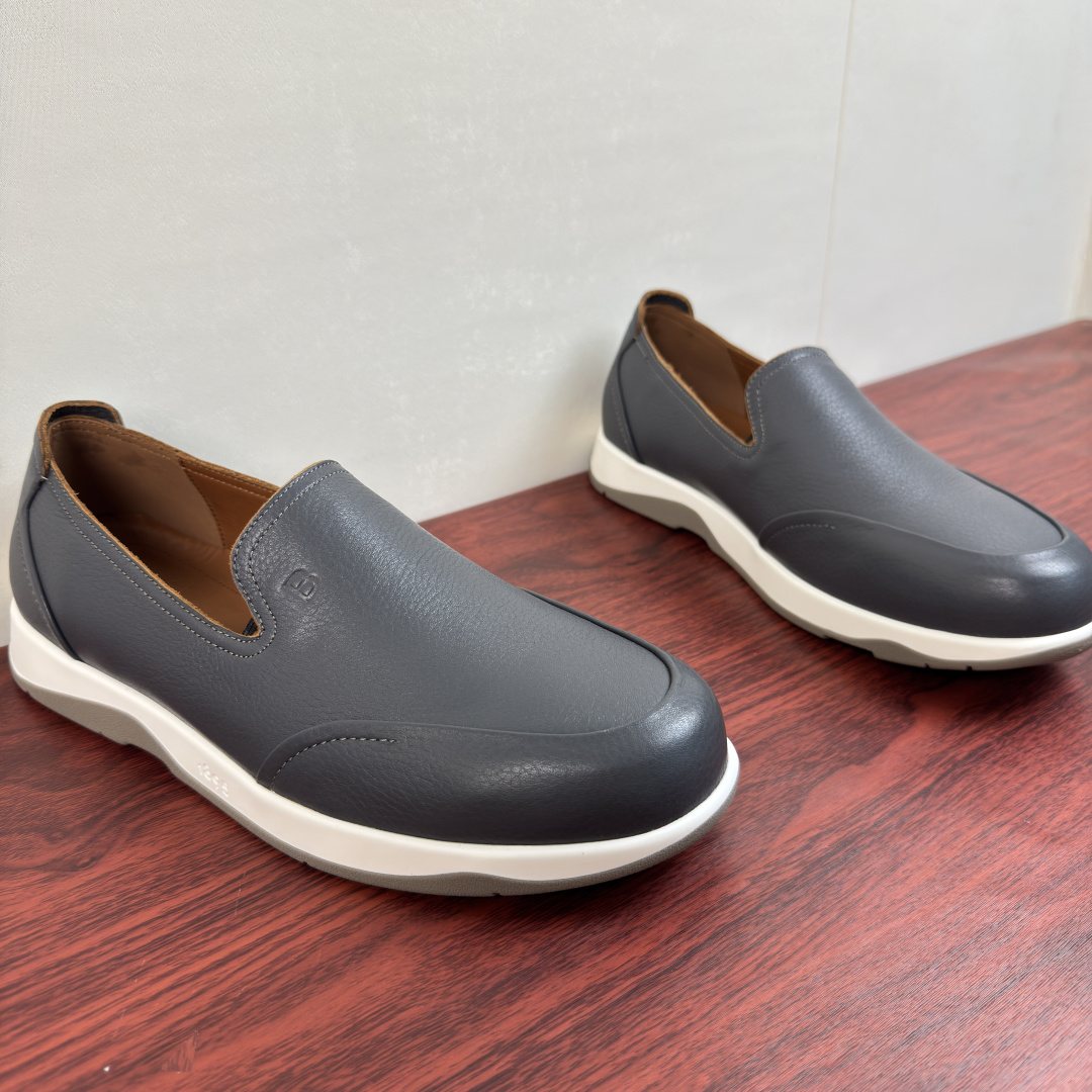 Berluti Pebbled Leather Slip-On Loafers — front